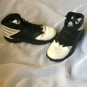 Black and white football cleats